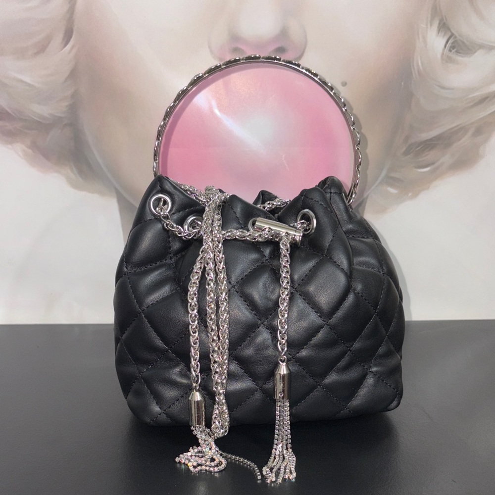 Elegant Black Quilted Handbag with Silver Accents